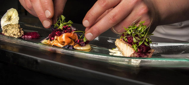 Chef plating food